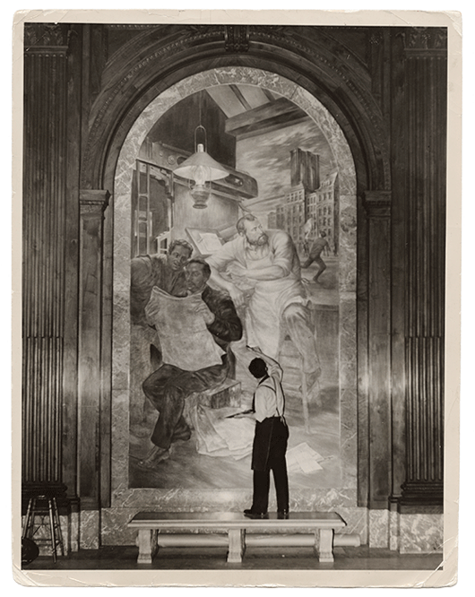 Artist painting mural at NYPL